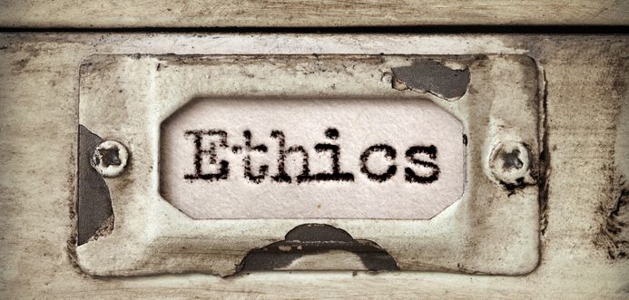 Filing cabinet label with the word 'Ethics' printed on it.