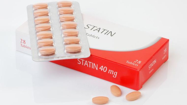 A photograph of a packet of statin tablets in a packet.