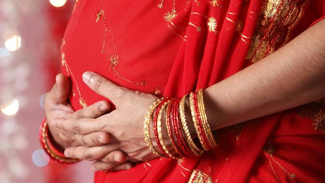 pregnant woman in sari
